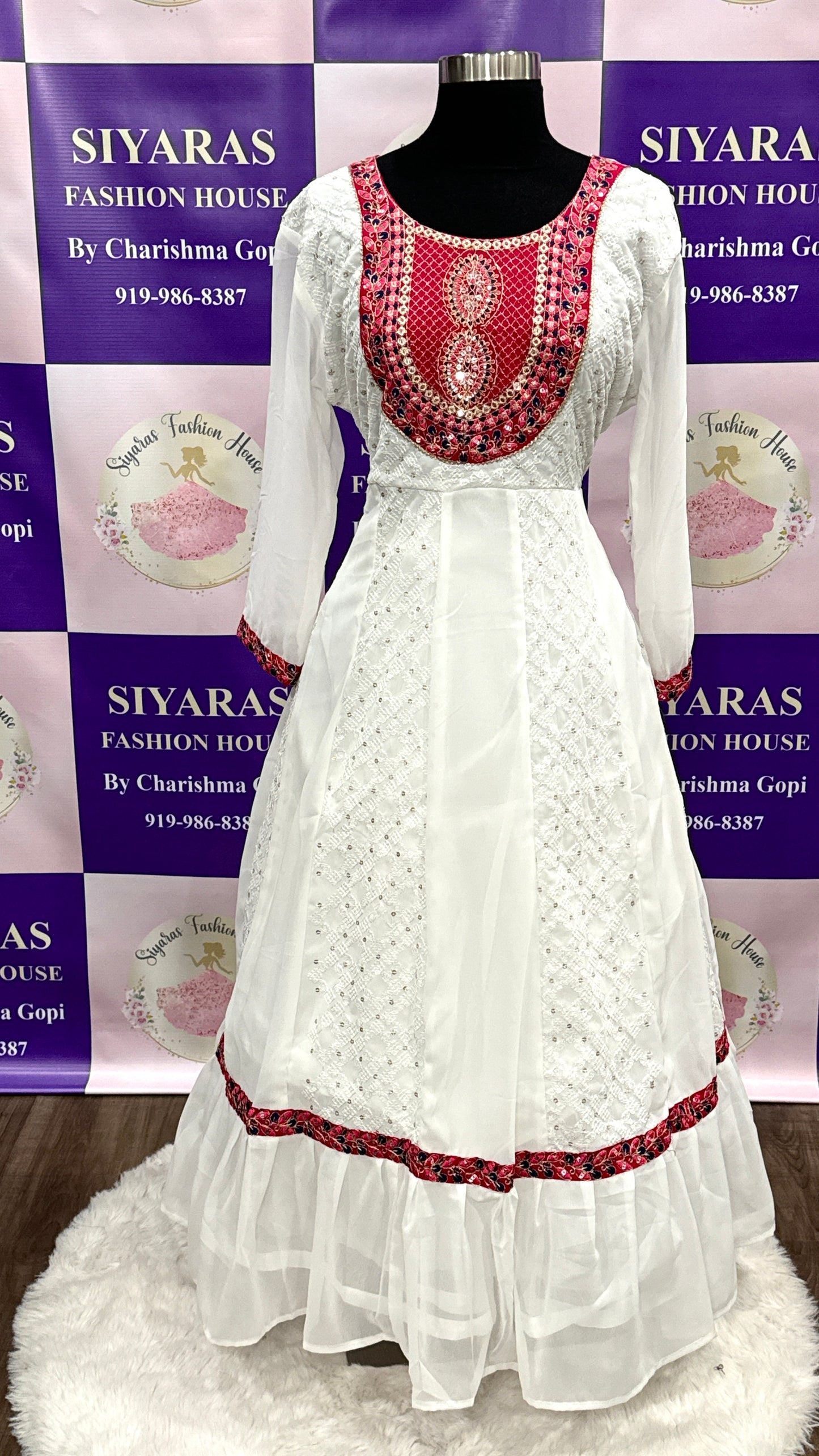 Beautiful gorgette white sequin gown. Chest size is 40 and 42. Gown length is 49