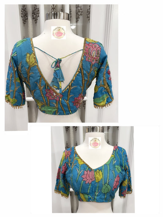 Teal blue Pure Pen Kalamkari Blouse with Maggam work hand painted with vegetable colors and elegant work bead hangings