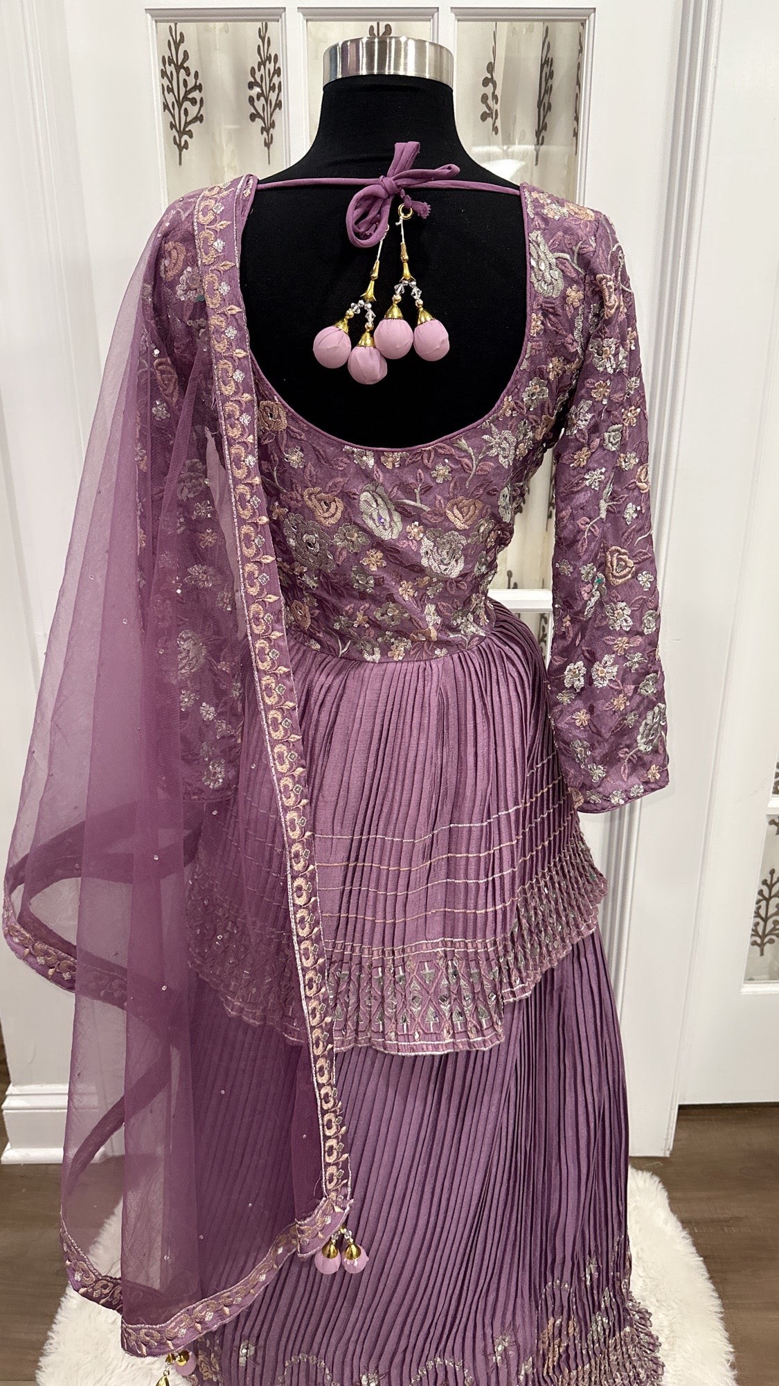 Beautiful Peplum style lehanga in elegant eggplant color with matching dupatta