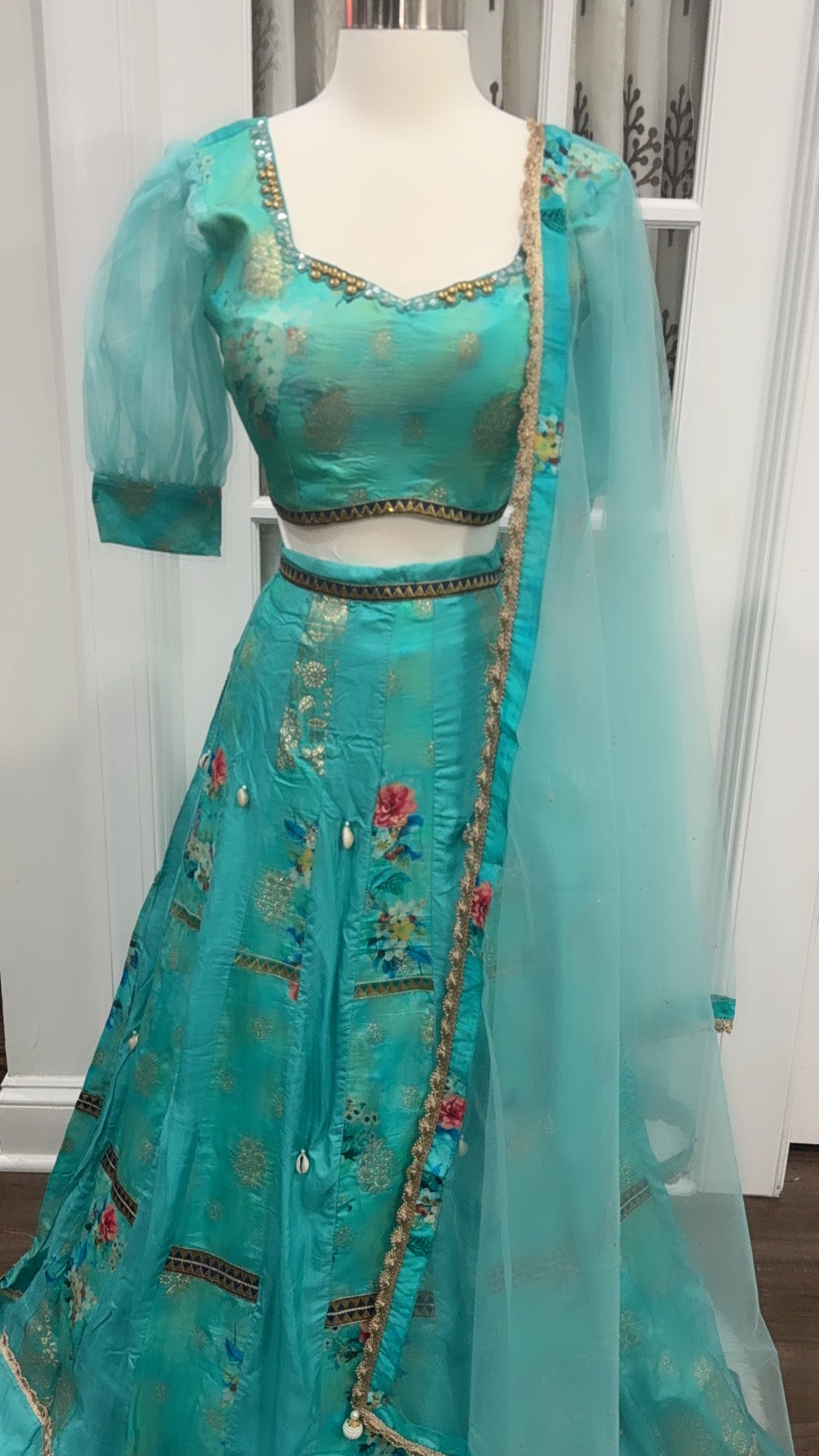Trendy Turquoise color silk Lehenga Choli for teens with organza puff sleeve size 38