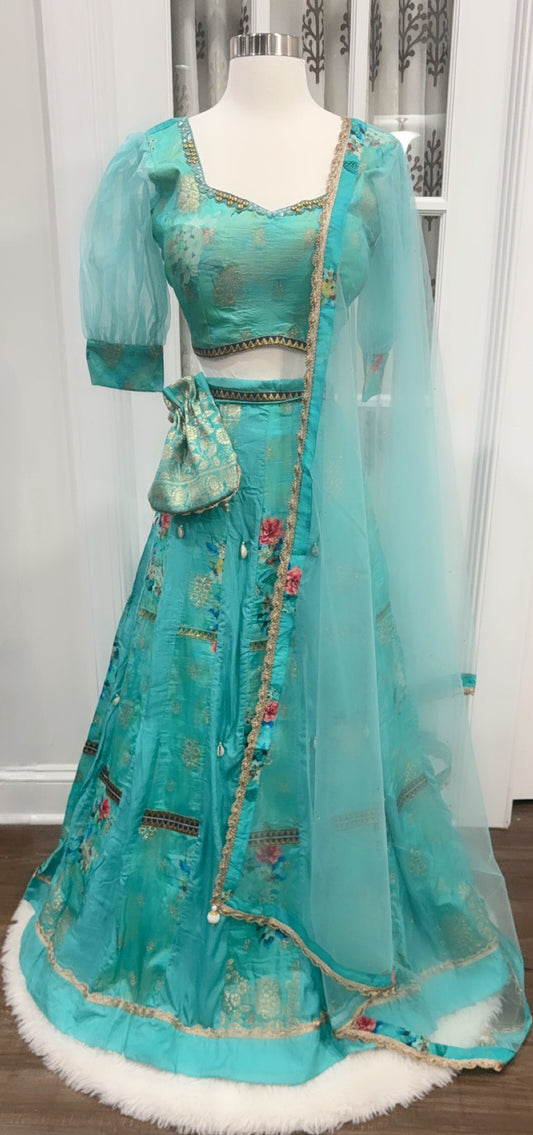 Trendy Turquoise color silk Lehenga Choli for teens with organza puff sleeve size 38