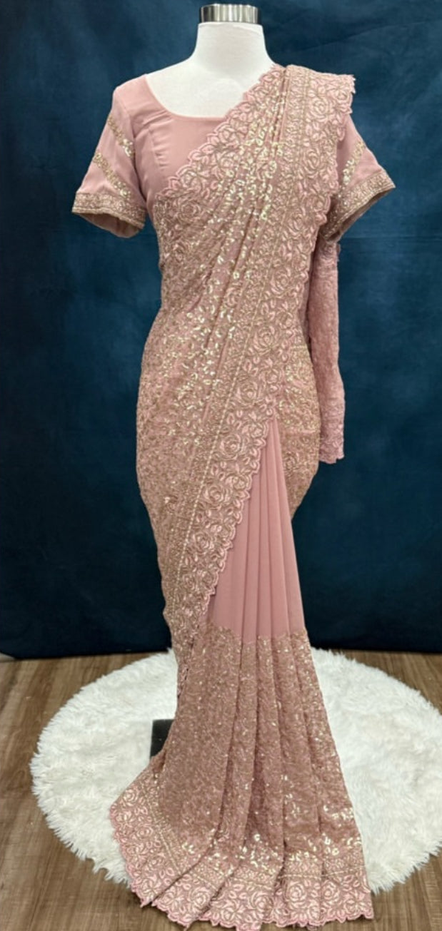 Elegant Georgette Sequin Partywear Saree for your special moments. Available in size 38 to 40.