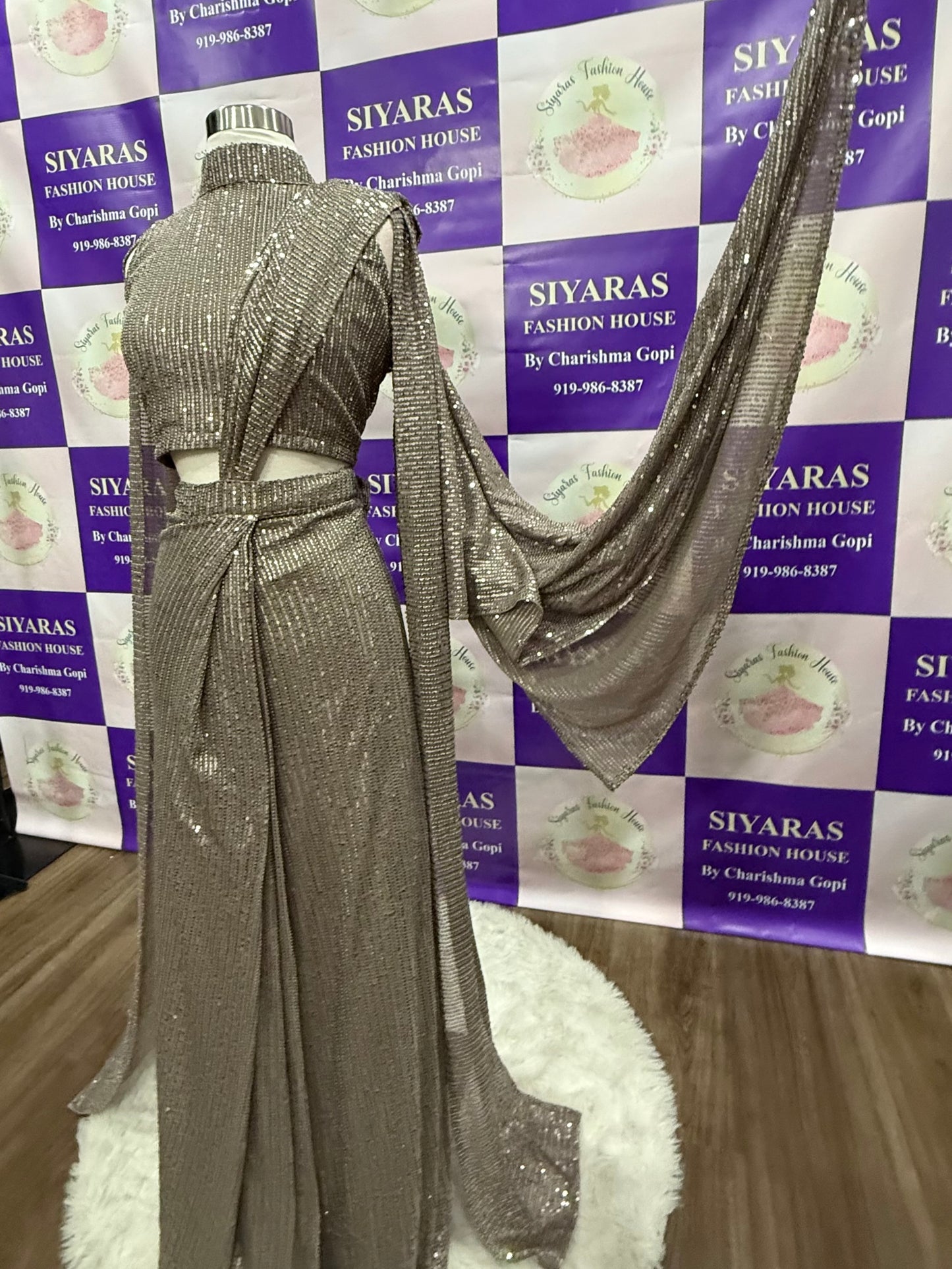 Beautiful Sequins party wear One minute saree. Huk and drape and it has a lovely cape hands. Available in size 38 ( Medium ) and  44 ( XXL )