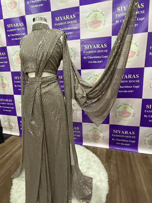 Beautiful Sequins party wear One minute saree. Huk and drape and it has a lovely cape hands. Available in size 38 ( Medium ) and  44 ( XXL )
