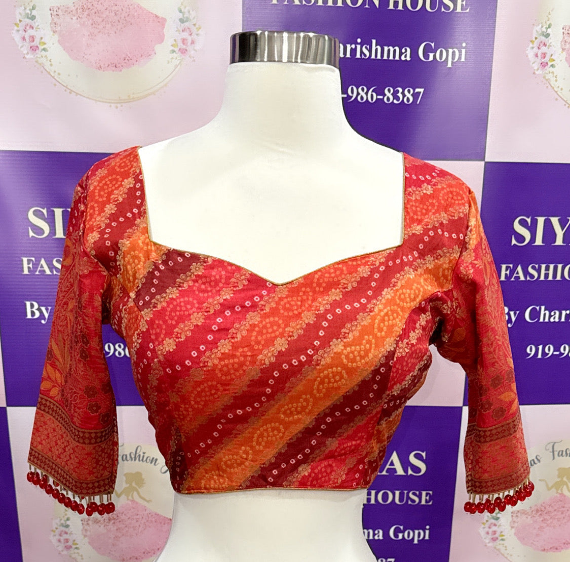 Beautiful Italian Silk Bandhini Lehanga with its trendy pattern blouse and glass bead embellishments