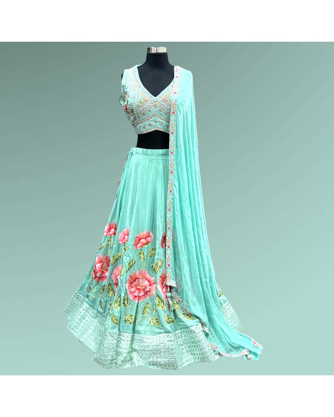 PartyWear lehenga in mint with mirror & sequin work is a showstopper! MmmnSize38&40