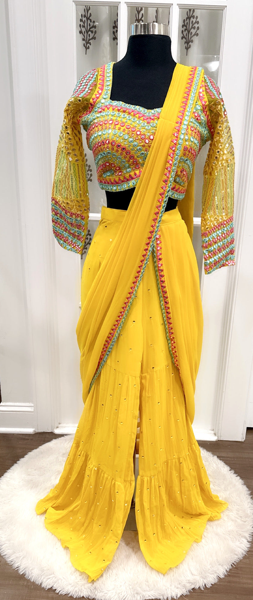 Chic and Trendy Haldi yellow Sharara set, adorned with stunning mirror work comes with attached dupatta size 40/42