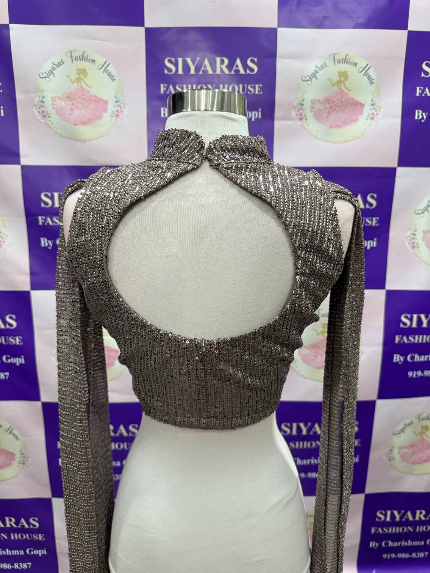 Beautiful Sequins party wear One minute saree. Huk and drape and it has a lovely cape hands. Available in size 38 ( Medium ) and  44 ( XXL )