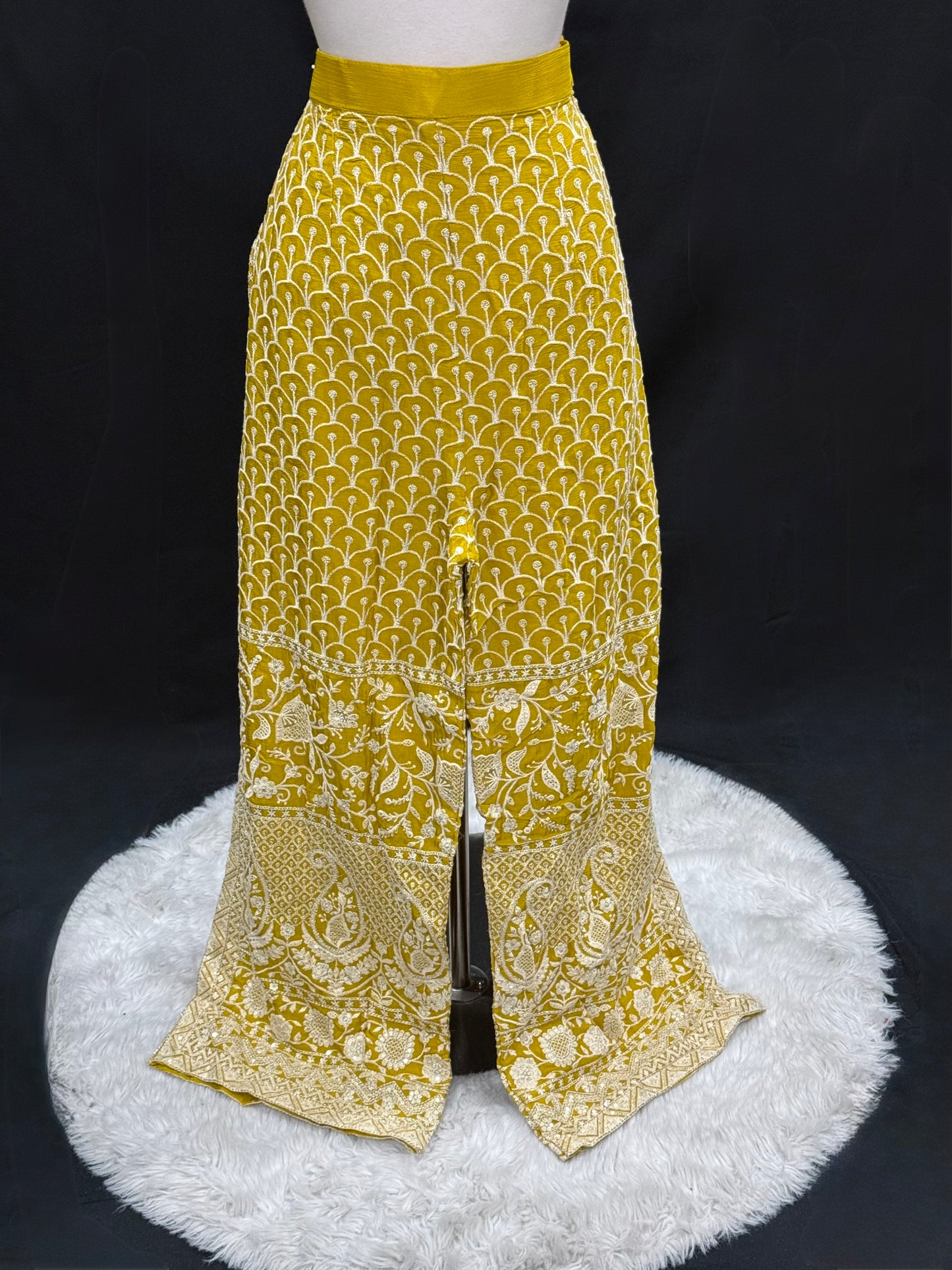 Step into elegance with this stunning mustard yellow Anarkali suit, featuring intricate thread and zari embroidery. Available in size 42.