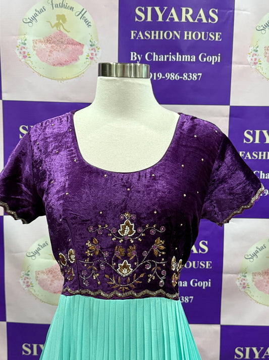 Beautiful traditional gown with Hand work on yoke in velvet fabric and flowy georgette on the bottom with dual shade. Available in size 44 inches