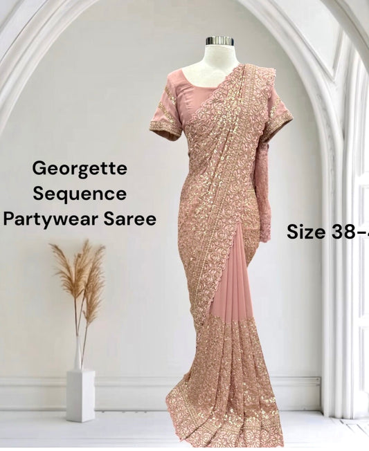 Elegant Georgette Sequin Partywear Saree for your special moments. Available in size 38 to 40.