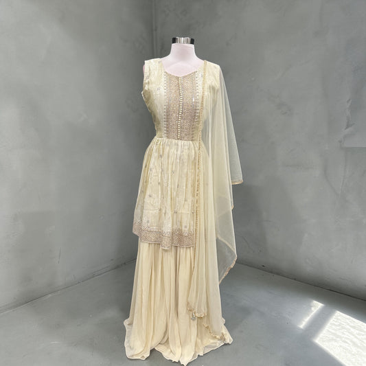 Elegant Off-white gold rich silk sharara set with delicate sequin detailing for that royal glow size 40