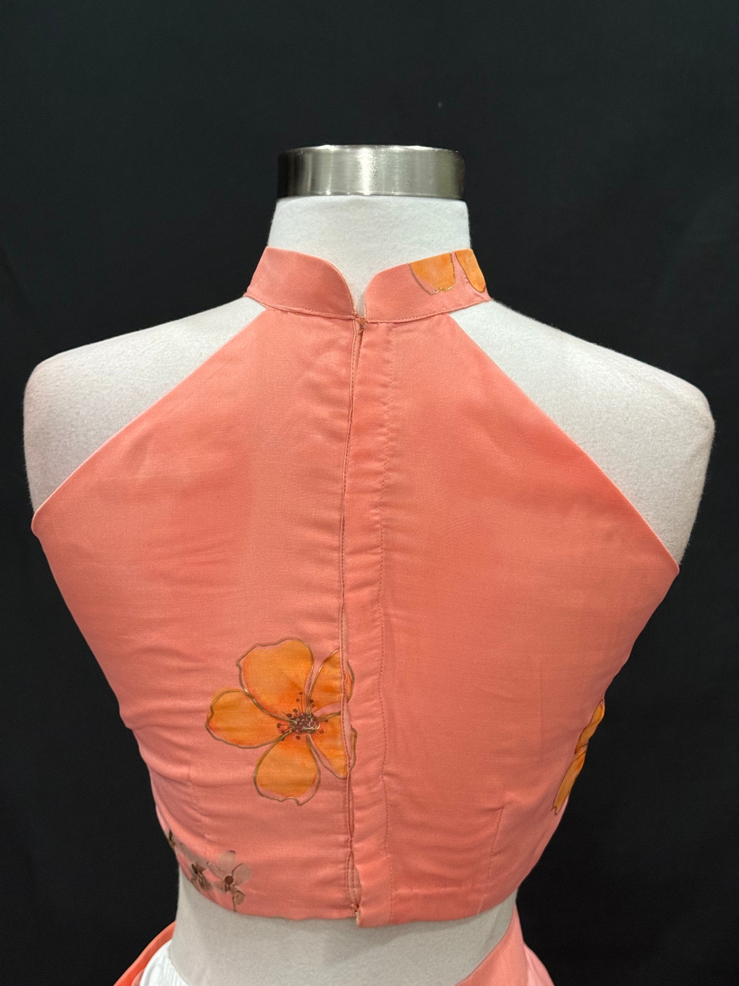 Step into elegance with this stunning peach floral lehenga set, perfect for festive occasions, weddings and receptions. Available in size 34/36/38.