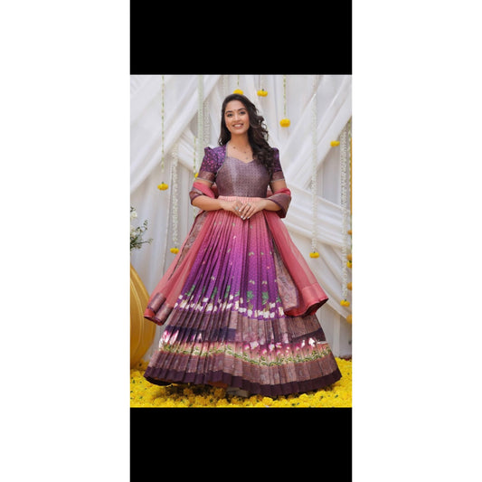 Beautiful Banarasi silk pichwai print Swarovski work long gown with matching dupatta.
Size small 36
Length: 54 in