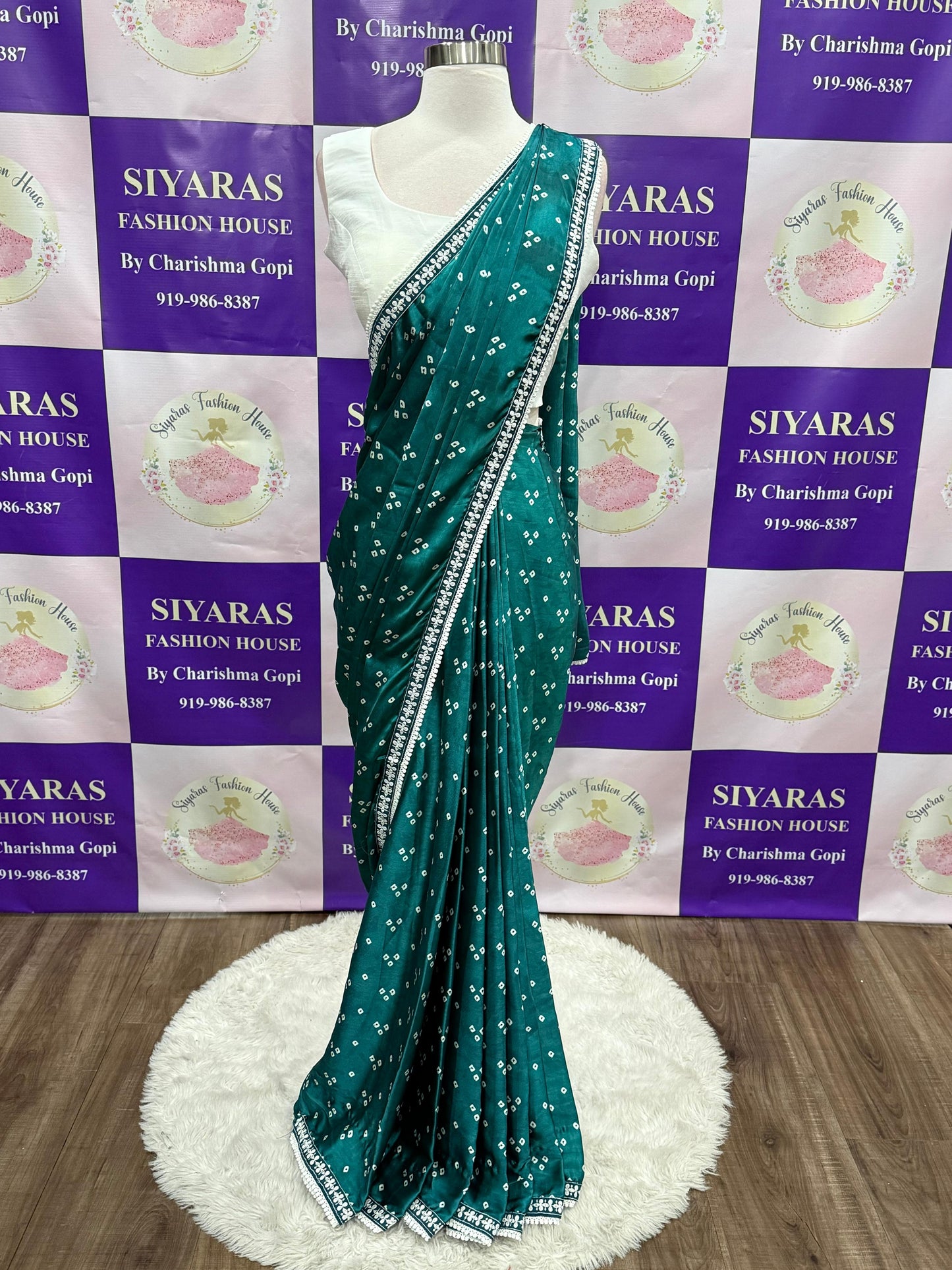 Beautiful Bhandini Partywear Saree perfect for any occasion. White blouse available in size 38 and 42.