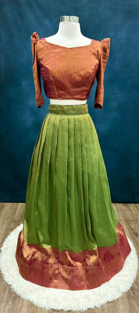 Gorgeous soft silk Half saree with butti hands in  rust magenta and green color combo stitched blouse size 36-42