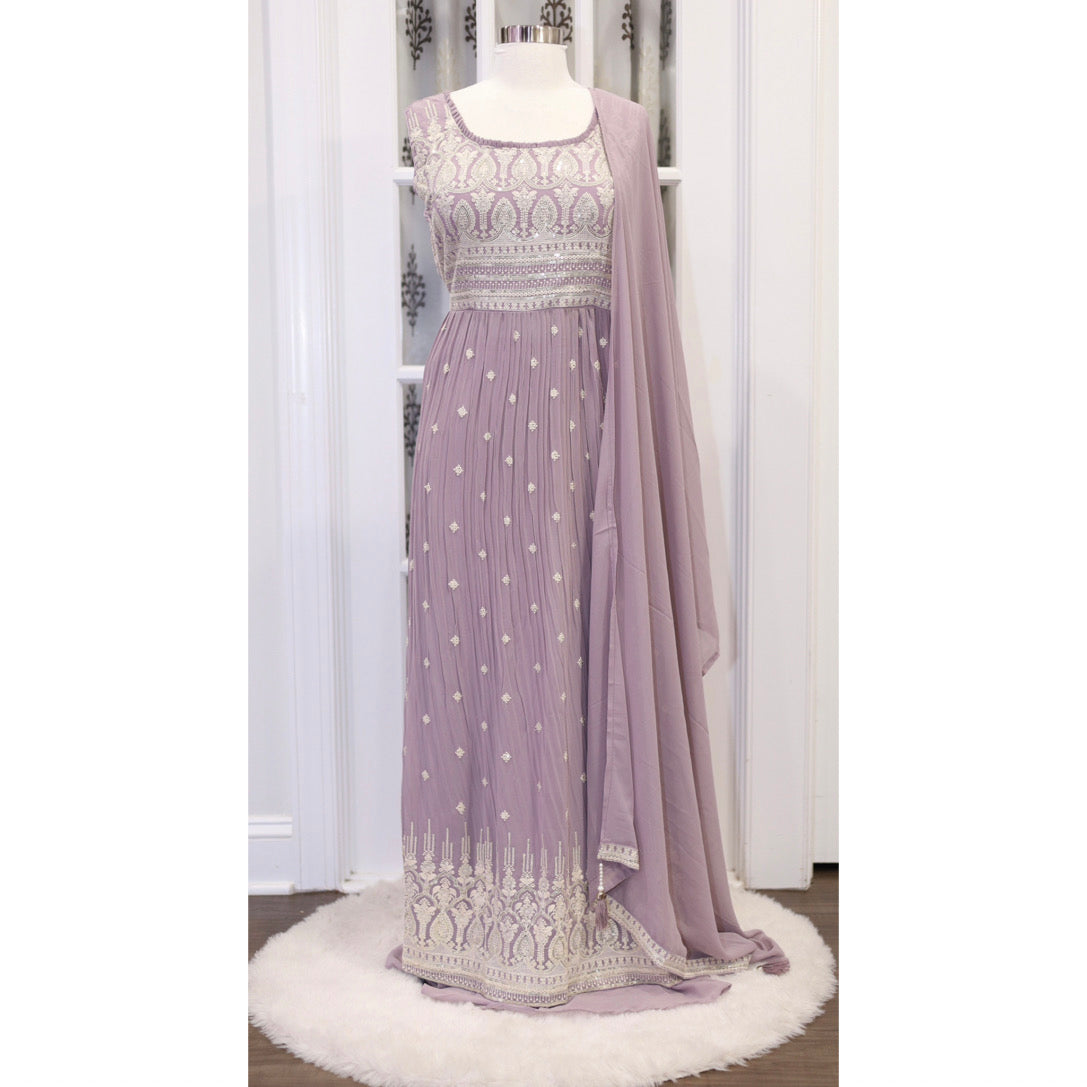Elegant and comfortable Nyra cut outfit, complete with palazzo pants and a beautiful dupatta! 💃🌟 Sizes pink 42, and Lavender 44.