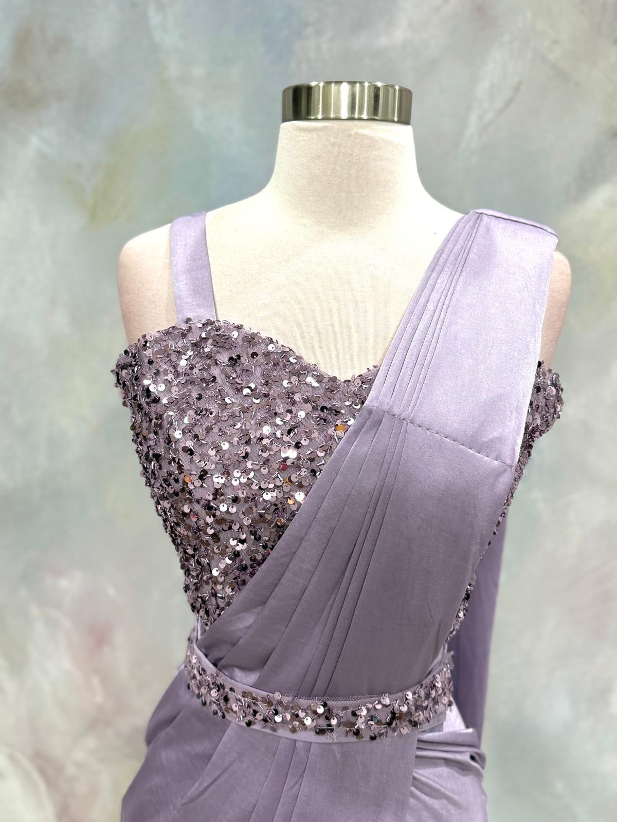 Elegance meets modern glamour! This stunning Indo-Western Ready-to-Wear Saree in a dreamy lavender shade. Size is 36/38
