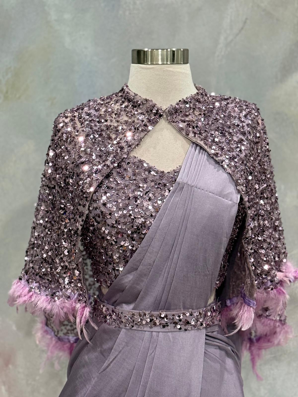 Elegance meets modern glamour! This stunning Indo-Western Ready-to-Wear Saree in a dreamy lavender shade. Size is 36/38