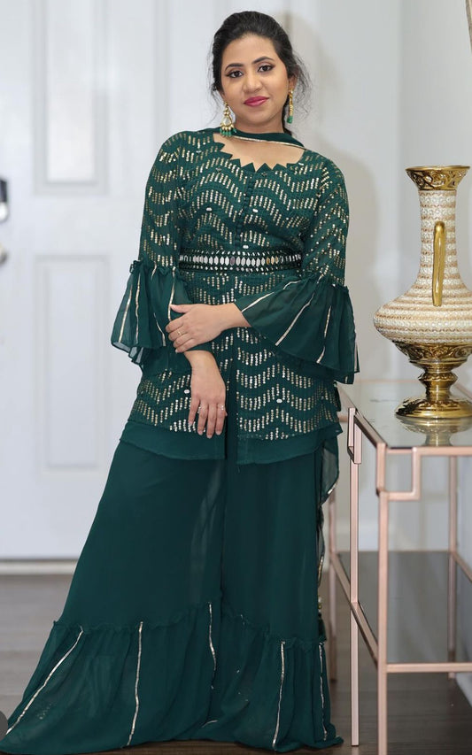 Beautiful Dark Green sharara with Mirror and sequence work in it includes 4 piece set. Fits size 40