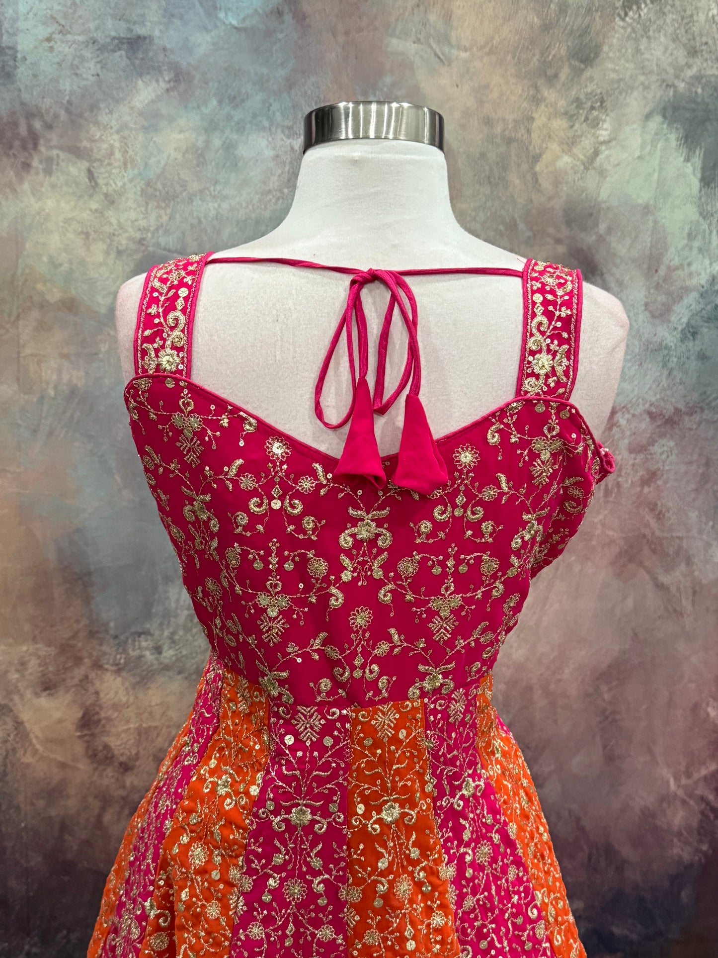 Stunning Partywear Peplum Sharara Set in vibrant shades of pink and orange comes with exquisite embroidery work. Perfect for weddings, sangeet, or festival. Size is  XL 42