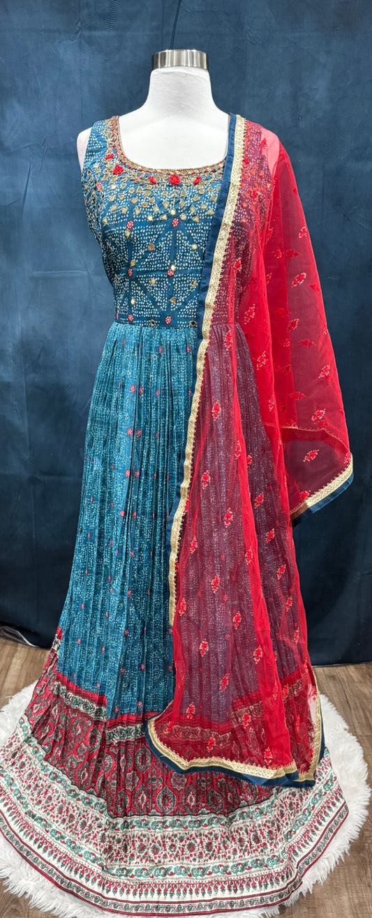 Beautiful Bandini party wear long gown with mirror and thread work on it. Available in size 44 inch