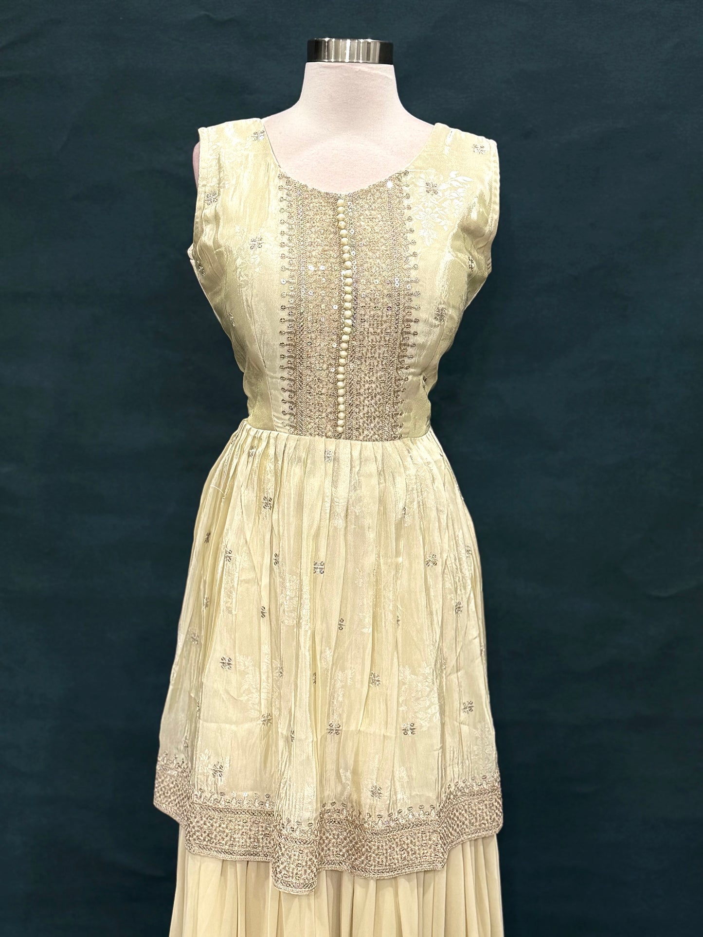 Elegant Off-white gold rich silk sharara set with delicate sequin detailing for that royal glow size 40