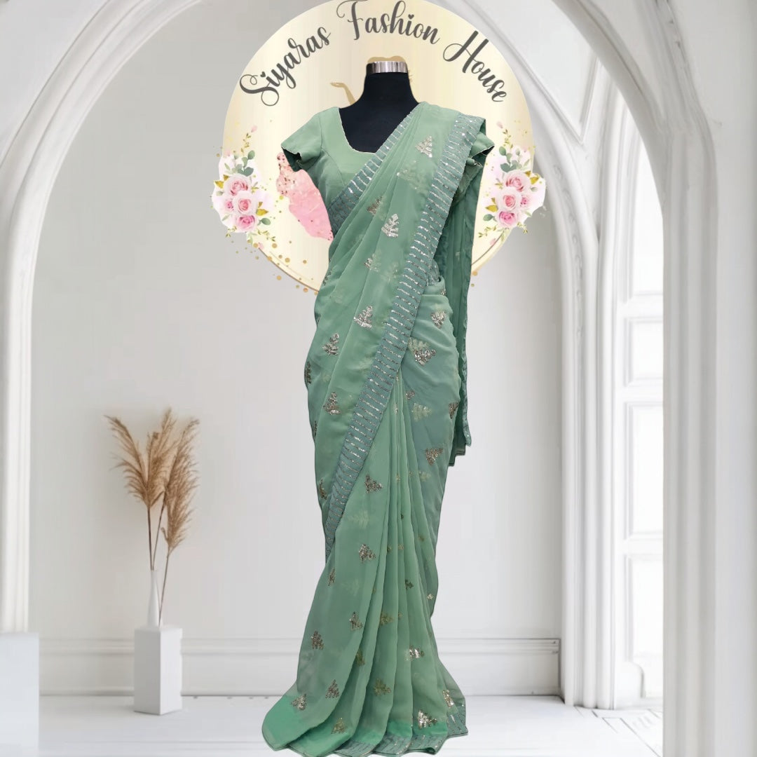 Beautiful georgette saree with sequin all over comes with stitched blouse. Available in size 36