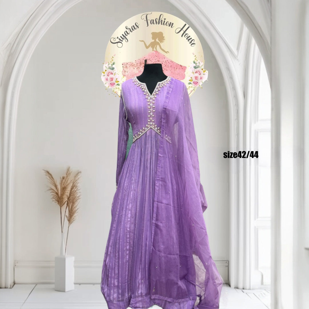 Beautiful georgette lavender gown with hand work on the yoke and hands. Available in size 42 and 44