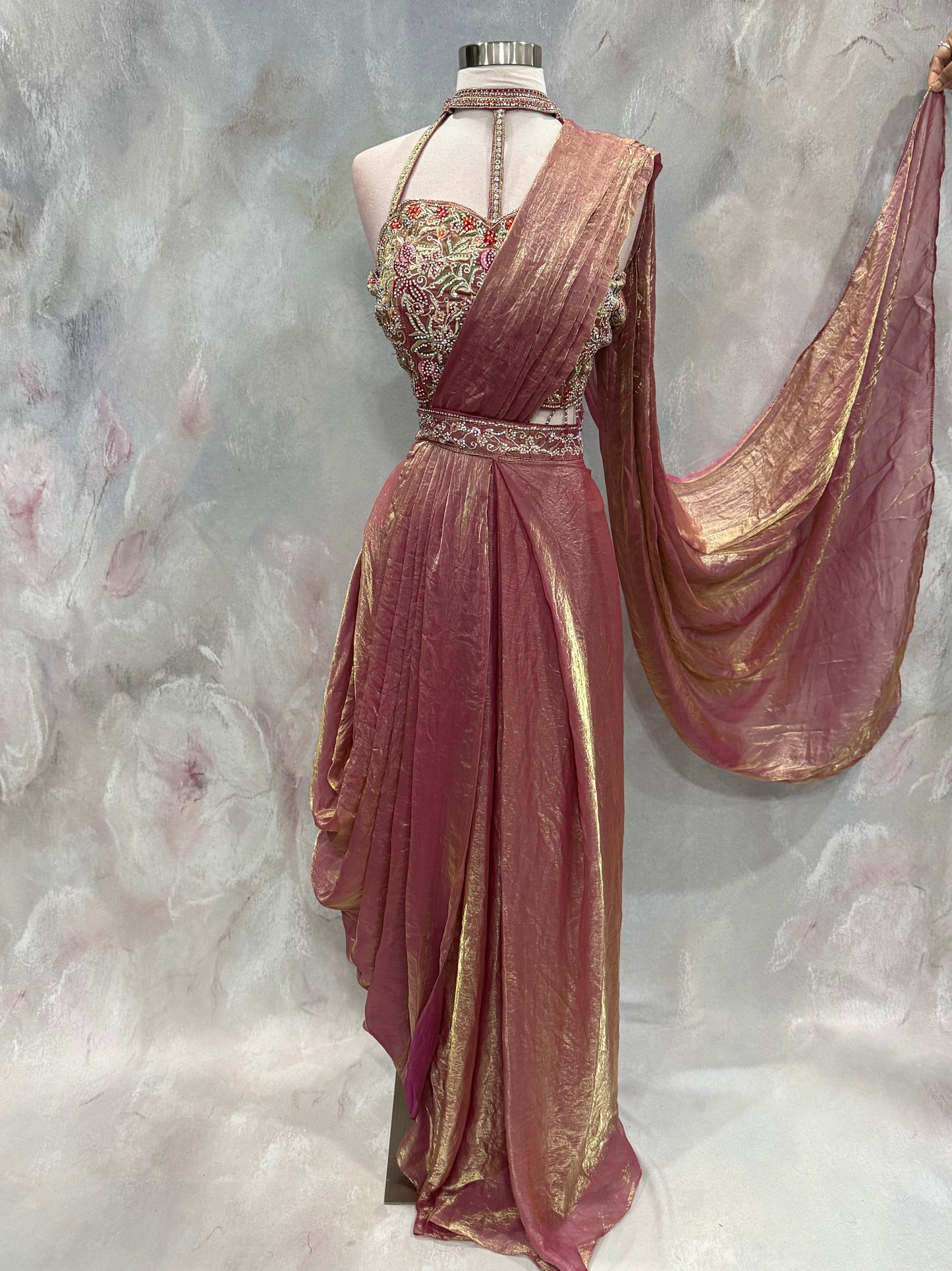 Stunning blush pink Indo-Western drape outfit featuring a beautifully embroidered tube-style blouse adorned with intricate stone, sequin, and zari work