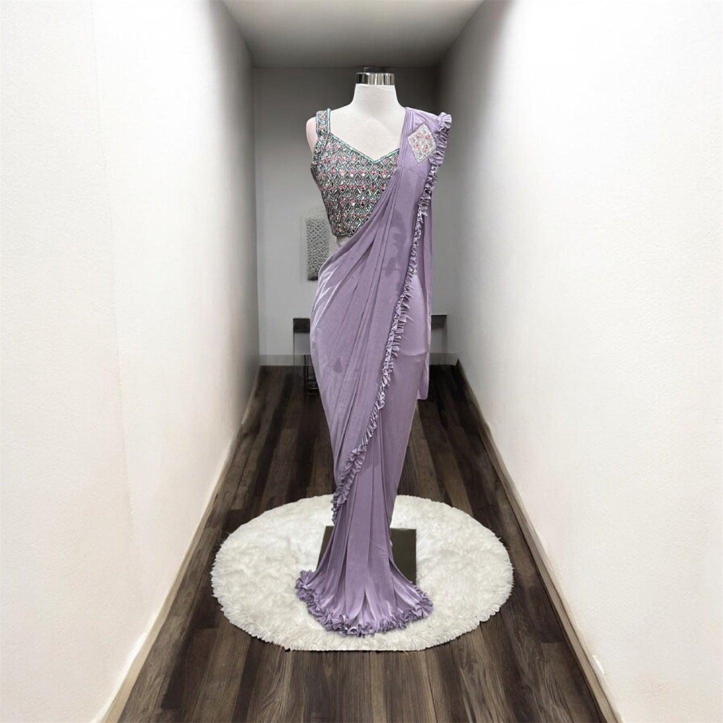 Beautiful ready to wear saree. perfect party wear saree for all occasions. Available in size 36.