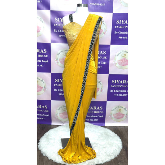 Lovely ready to wear one minute saree perfect party wear for any occasion. Available in size 38 and 40.