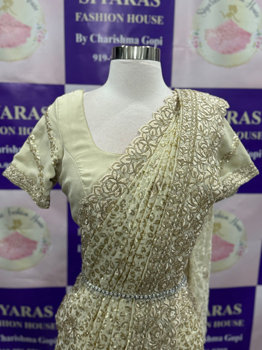 Beautiful partywear sequence Saree in off white color. Available in size 42 to 44.