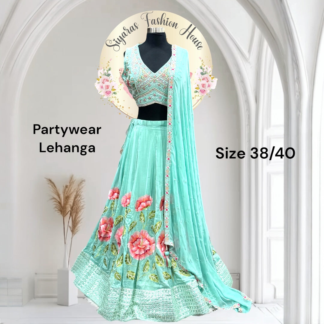 PartyWear lehenga in mint with mirror & sequin work is a showstopper! MmmnSize38&40