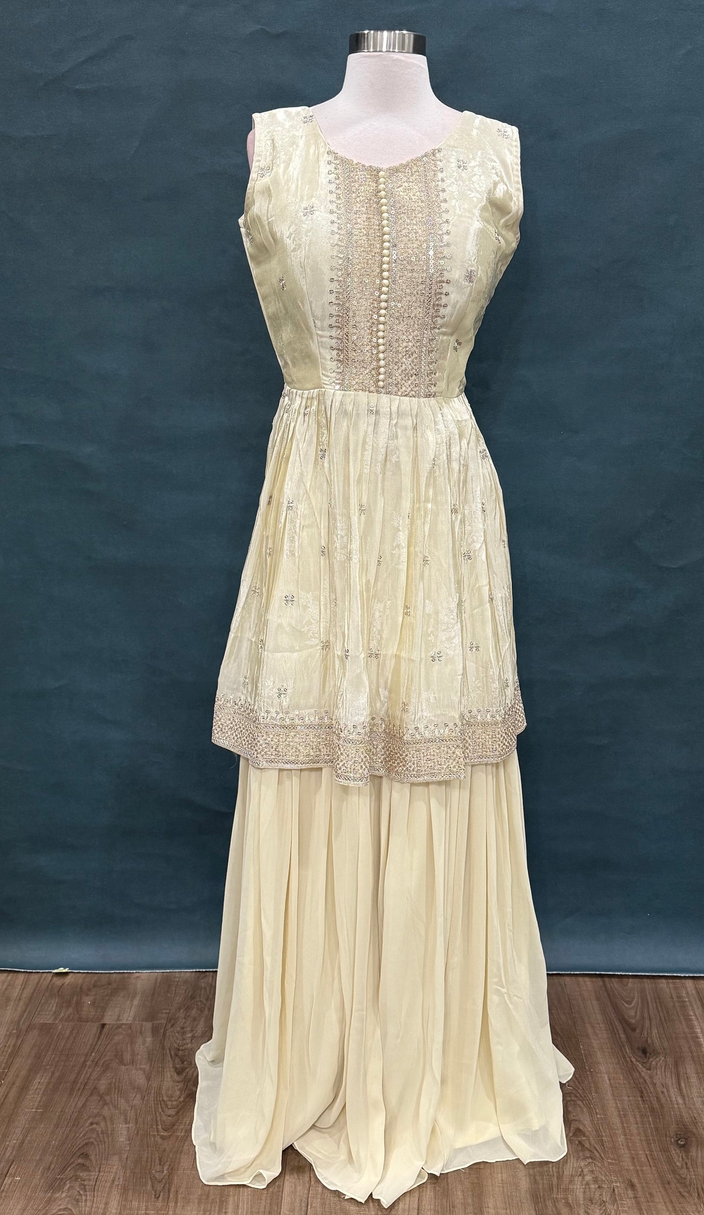 Elegant Off-white gold rich silk sharara set with delicate sequin detailing for that royal glow size 40