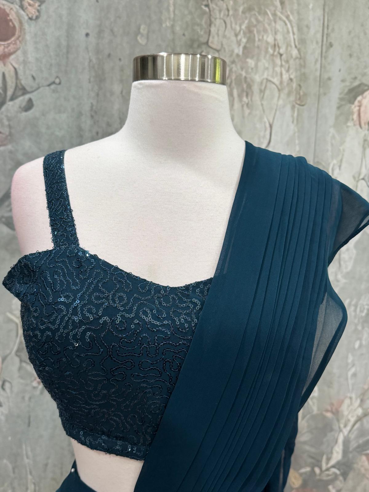 Beautiful Drape style lehenga in teal blue color. Available in size 34/36.