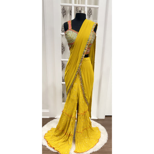 Beautiful Drape style yellow Sharara set, adorned with stunning mirror work comes with attached dupatta size 40/42