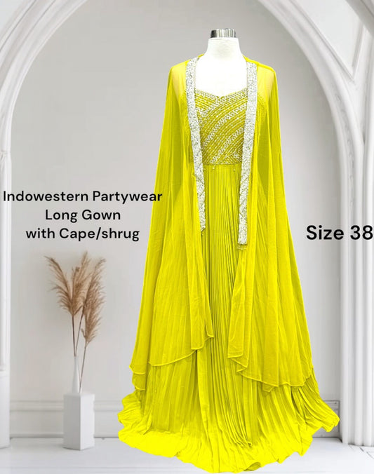 Gorgeous Yellow Indo-Western Long Gown with Cape / Shrug (Size 38, Length 58). Can be altered to fit your needs.
A dreamy yellow statement gown for every festive mood 💛