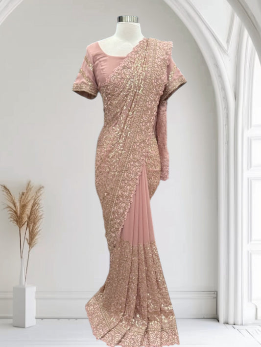 Elegant Georgette Sequin Partywear Saree for your special moments. Available in size 38 to 40.