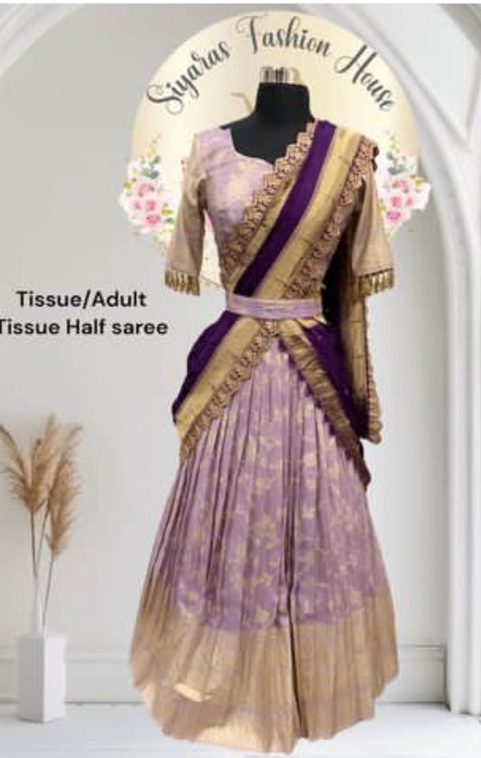 Beautiful tissue silk half saree customized with hangings. Available in size 36