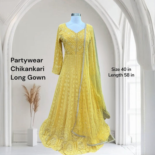 Beautiful party wear yellow Chikankari long gown available in size 40. Perfect for wedding/ sangeeth/ birthday parties and other occasions.