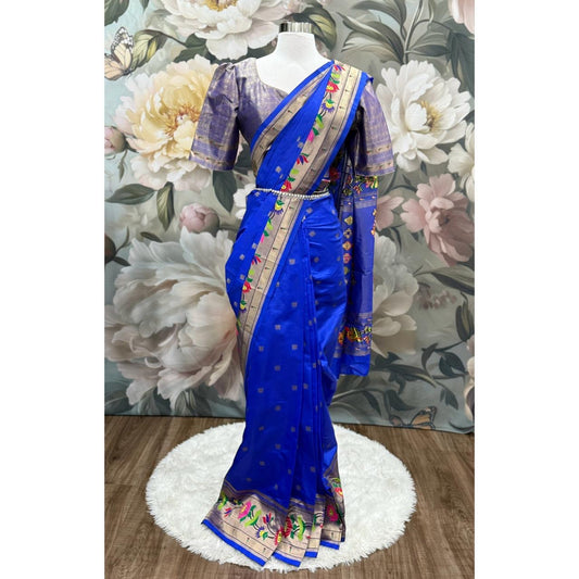 ❤️Pythani Silk Saree in striking royal blue is a masterpiece of tradition and artistry with a contrast silver zari border and vibrant motifs, it’s paired with a lustrous designer blouse
Available in size 40-44