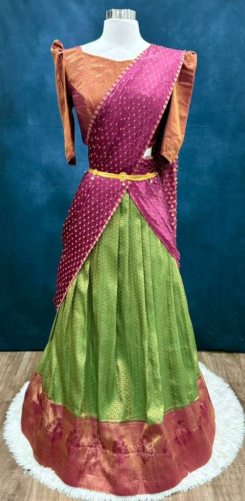 Gorgeous soft silk Half saree with butti hands in  rust magenta and green color combo stitched blouse size 36-42