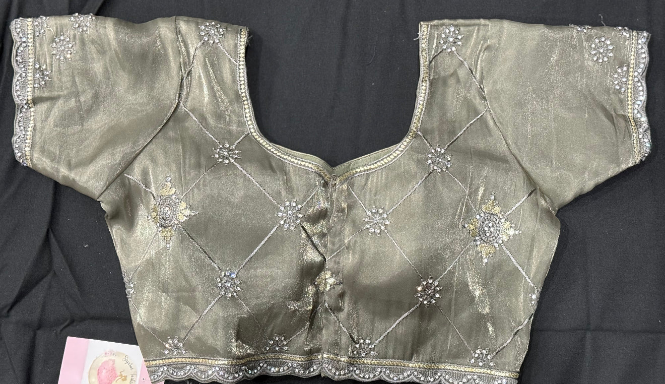 Premium Partywear organza saree. A subtle sparkle of Swarovski & elegant embroidery for a truly timeless look. 
 Comes with matching satin inner skirt , Blouse fits 38-42.