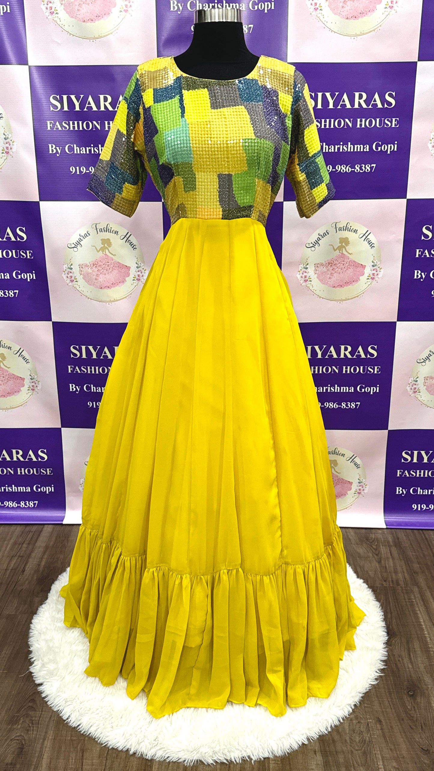 Beautiful yellow gown Fabricated in sequins and georgette fabrics, the Anarkali with ruffles respectively, make a Mint Yellow color combination.