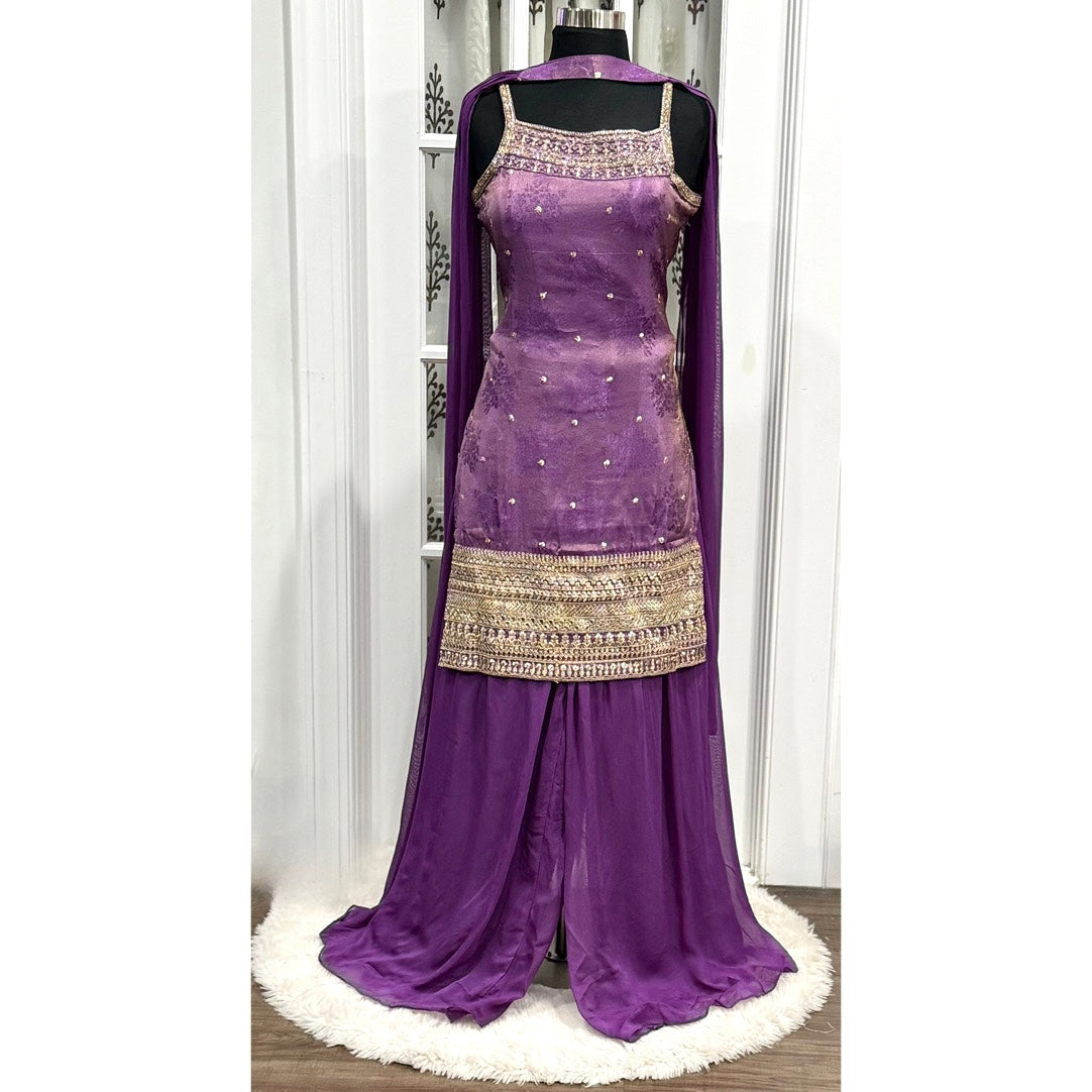 PURPLE BANARAS TISSUE SEQUINS, ZARI, MIRROR, STONE AND BEADS WORK PALAZZO SALWAR SUIT.Available in size 40