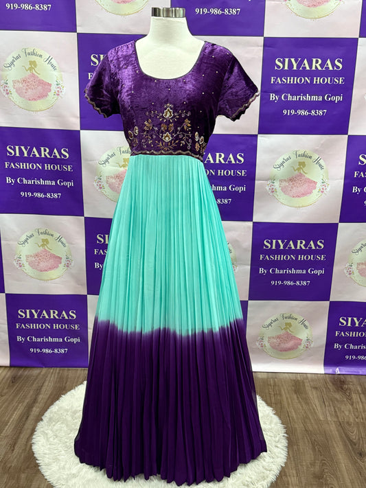 Beautiful traditional gown with Hand work on yoke in velvet fabric and flowy georgette on the bottom with dual shade. Available in size 44 inches