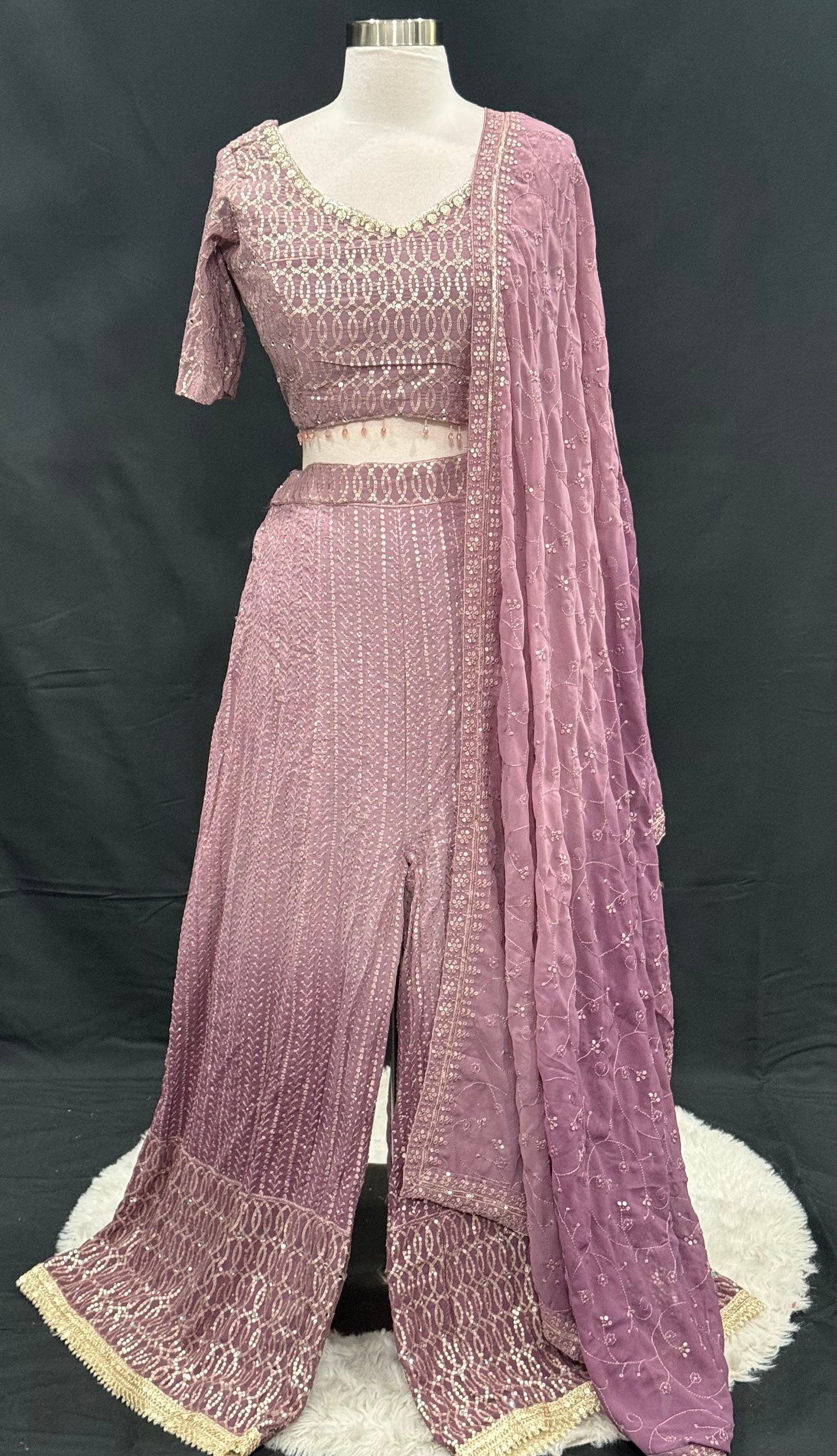 Elevate your ethnic wardrobe with this elegant Embroidered Palazzo Set, designed for festive. Available in size 38.

Dusky Lavender to dark. Embroidered Palazzo Set with Dupatta