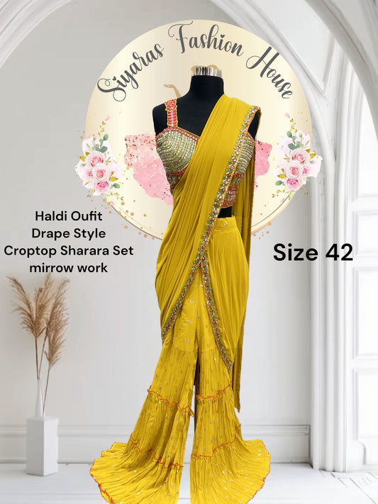 Beautiful Drape style yellow Sharara set, adorned with stunning mirror work comes with attached dupatta size 40/42