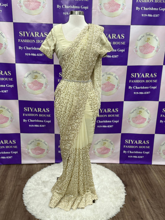 Beautiful partywear sequence Saree in off white color. Available in size 42 to 44.